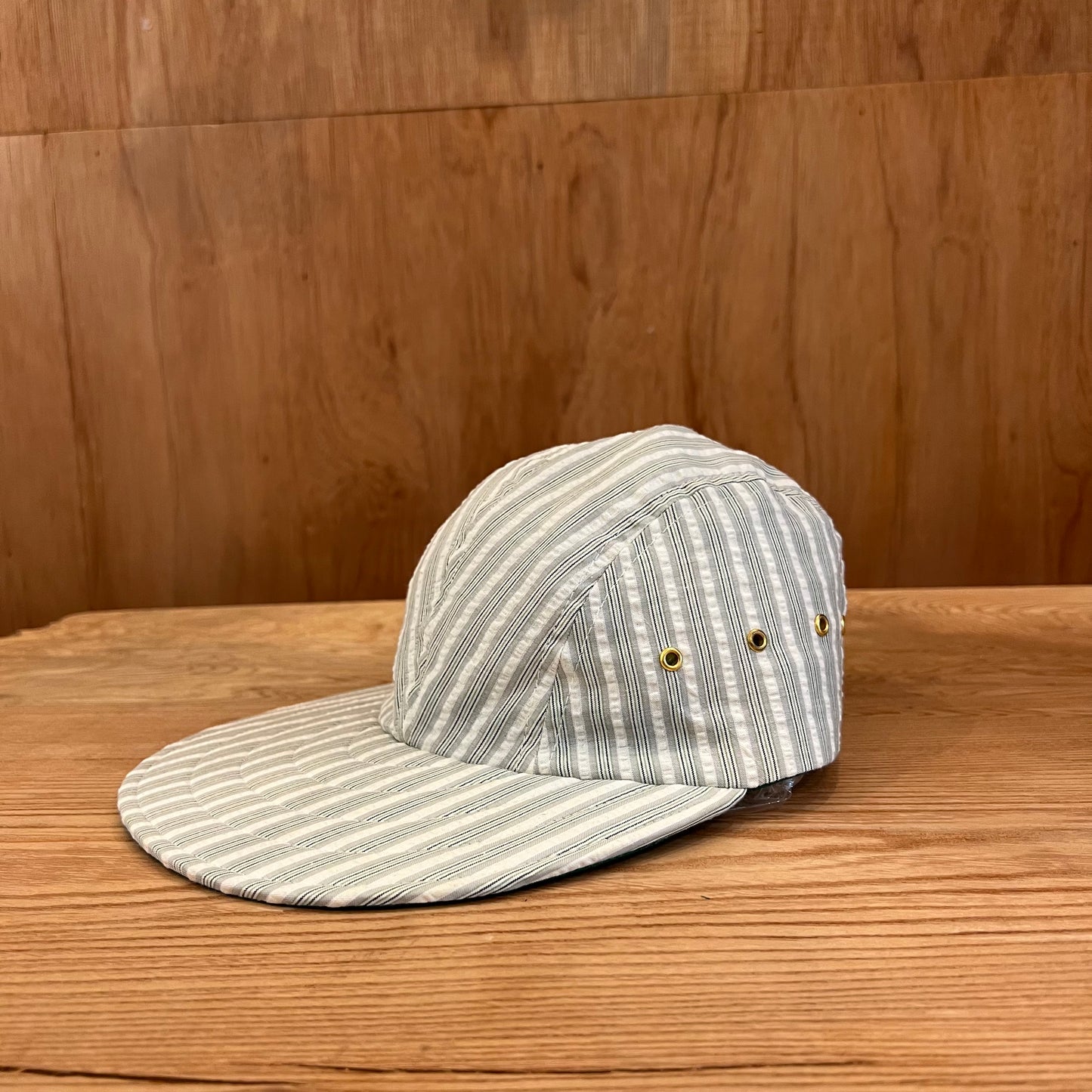 LONG BILL 4 PANEL HAT BY M.I.T GREEN STRIPE