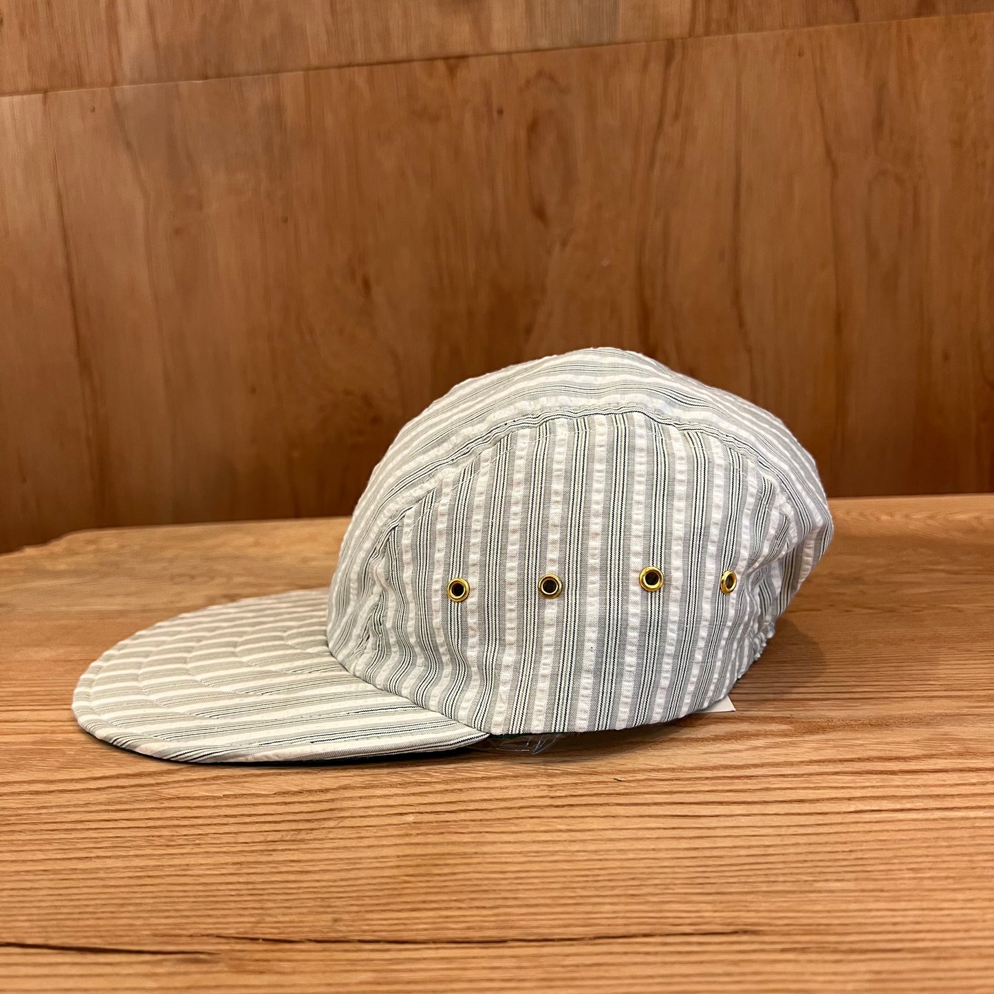 LONG BILL 4 PANEL HAT BY M.I.T GREEN STRIPE